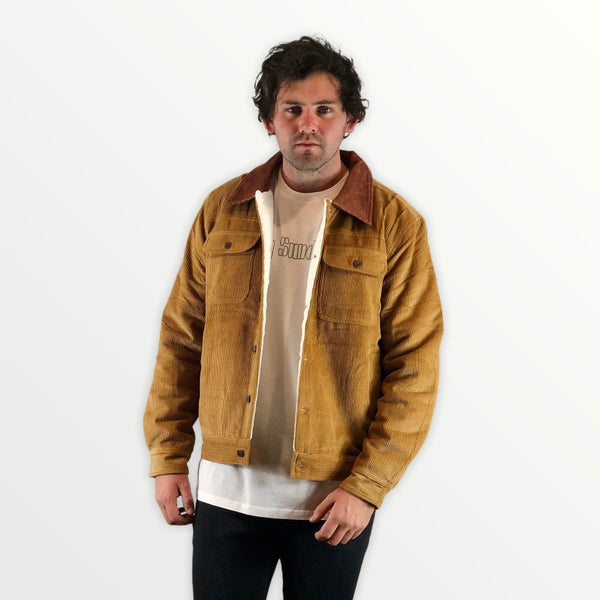 man wearing tan brown corduroy jacket